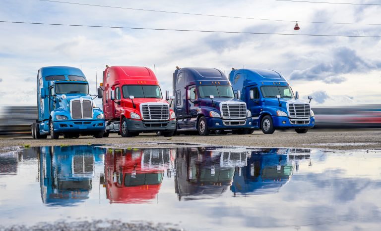 fleet of trucks at parking lot