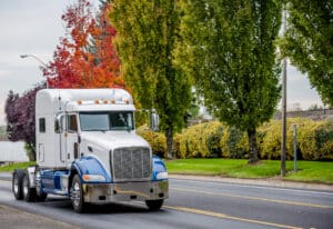 Big rig and autumn leaves
