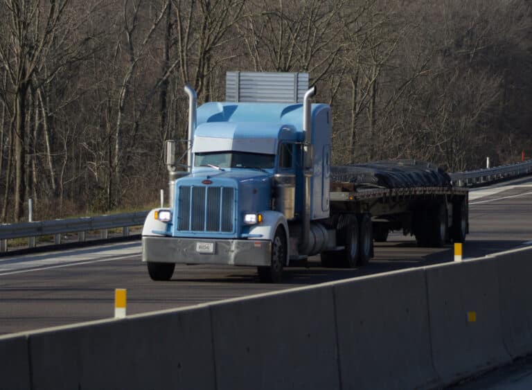 Blue truck on highway