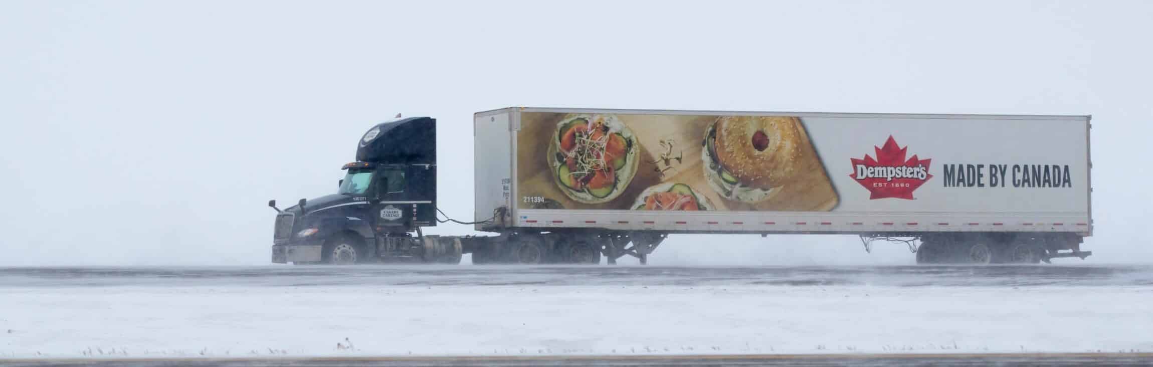 truck on winter road in Canada