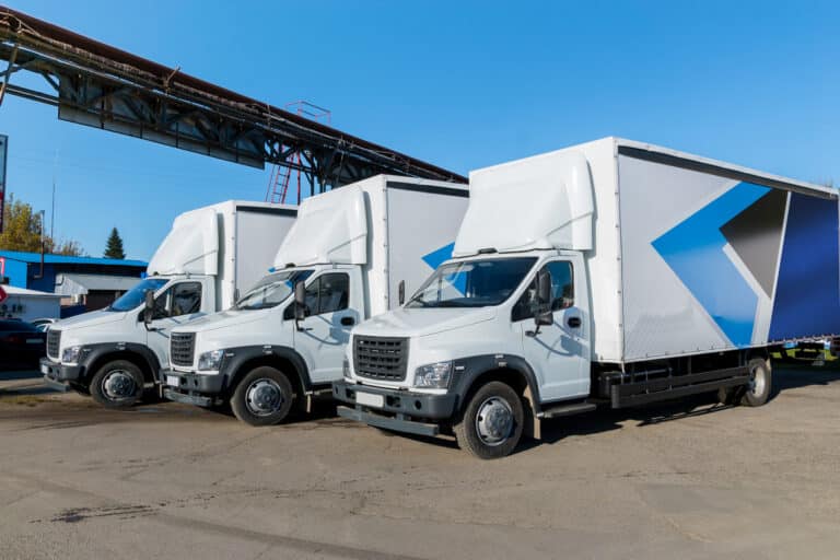 white trucks ready for departure