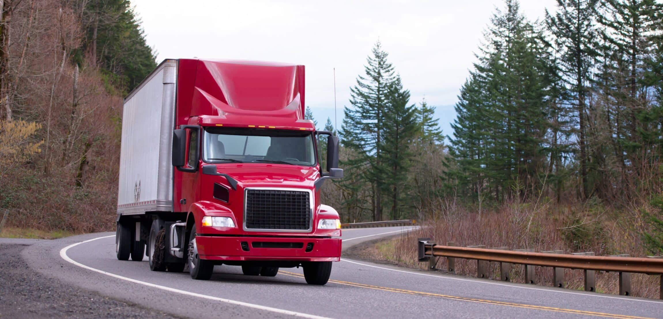 red semi truck on road