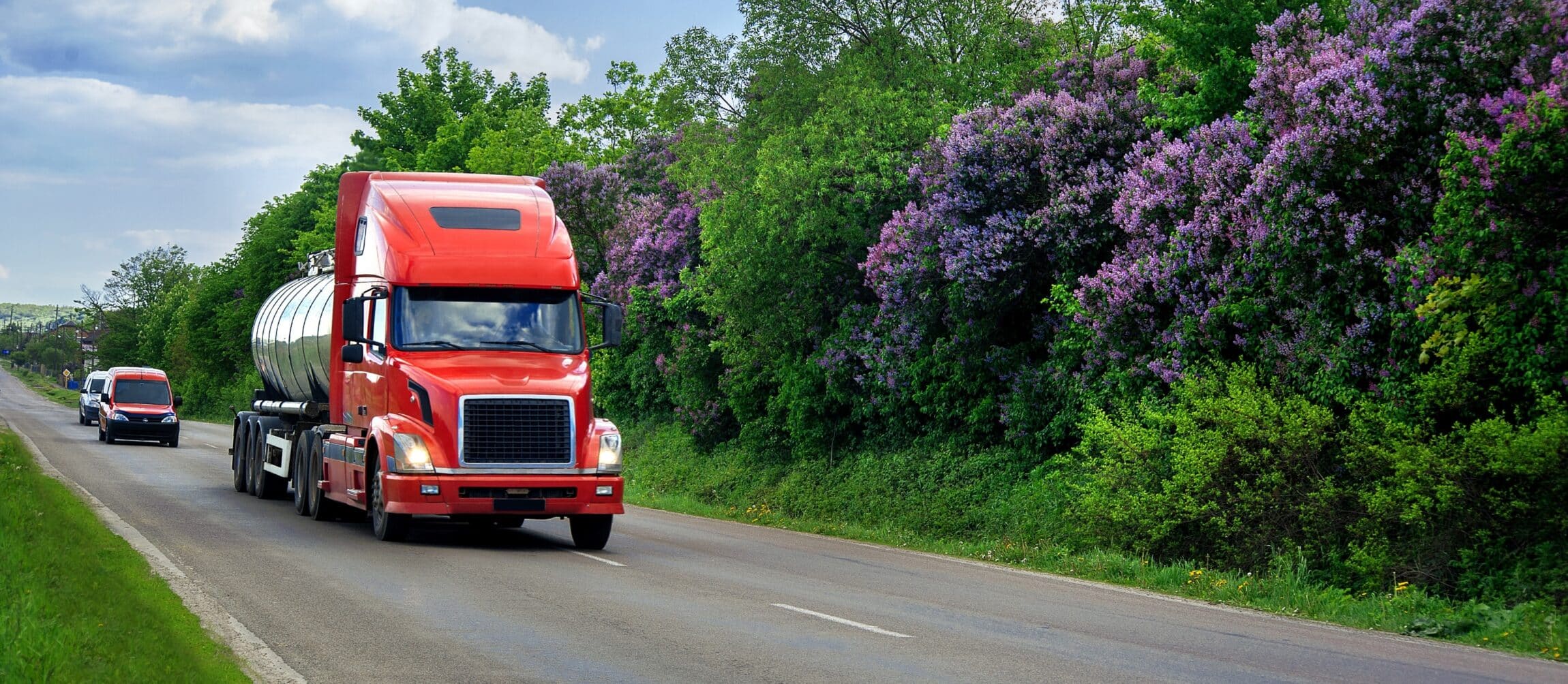 red semi truck on road