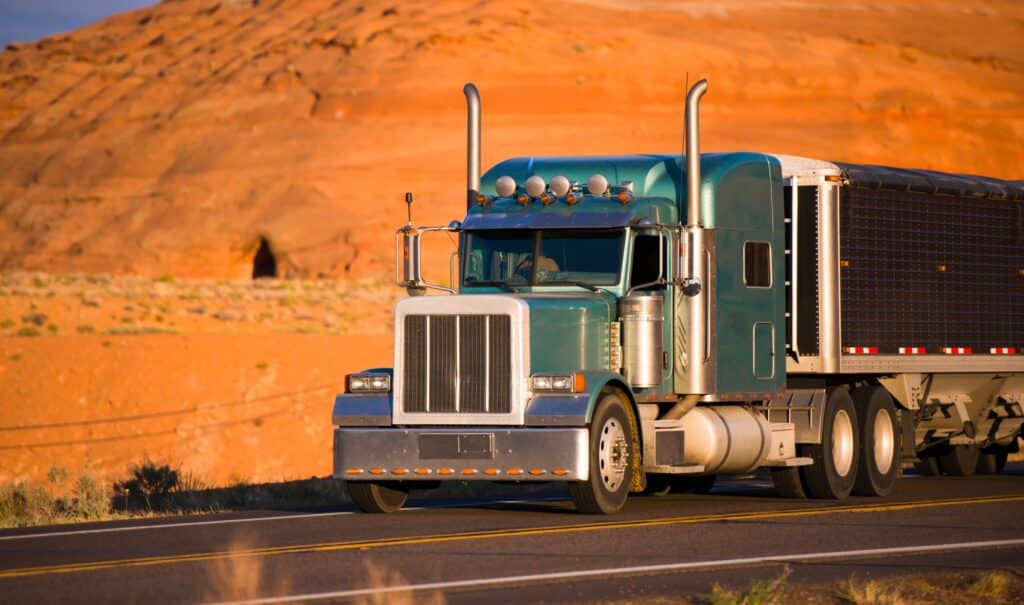 Classic green big rig semi truck