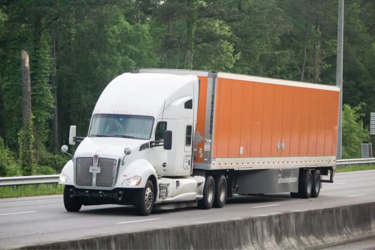 Semi with orange trailer