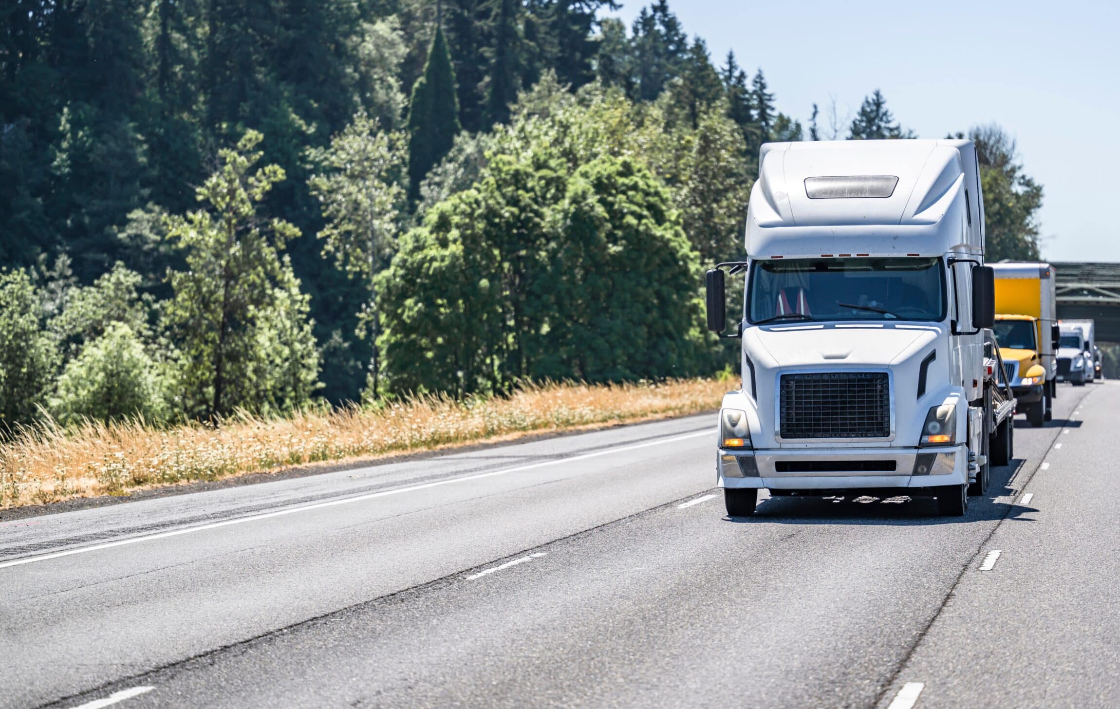 White big rig on the road