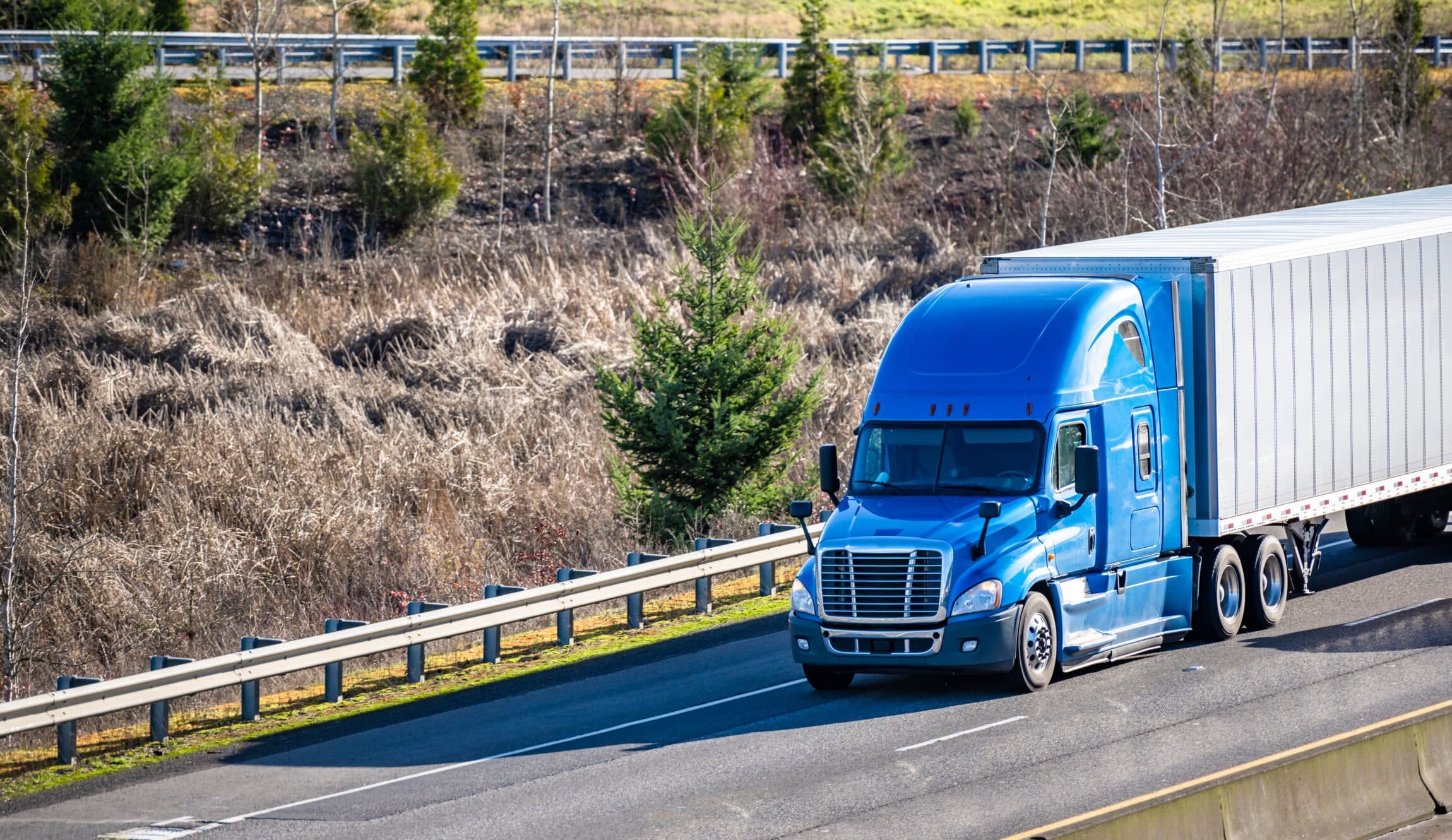 Classic big rig blue semi truck tractor