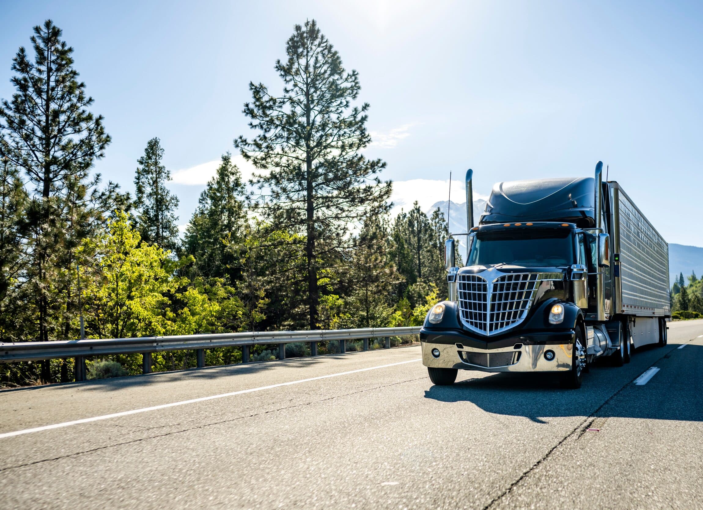 Industrial Long hauler big rig black semi truck