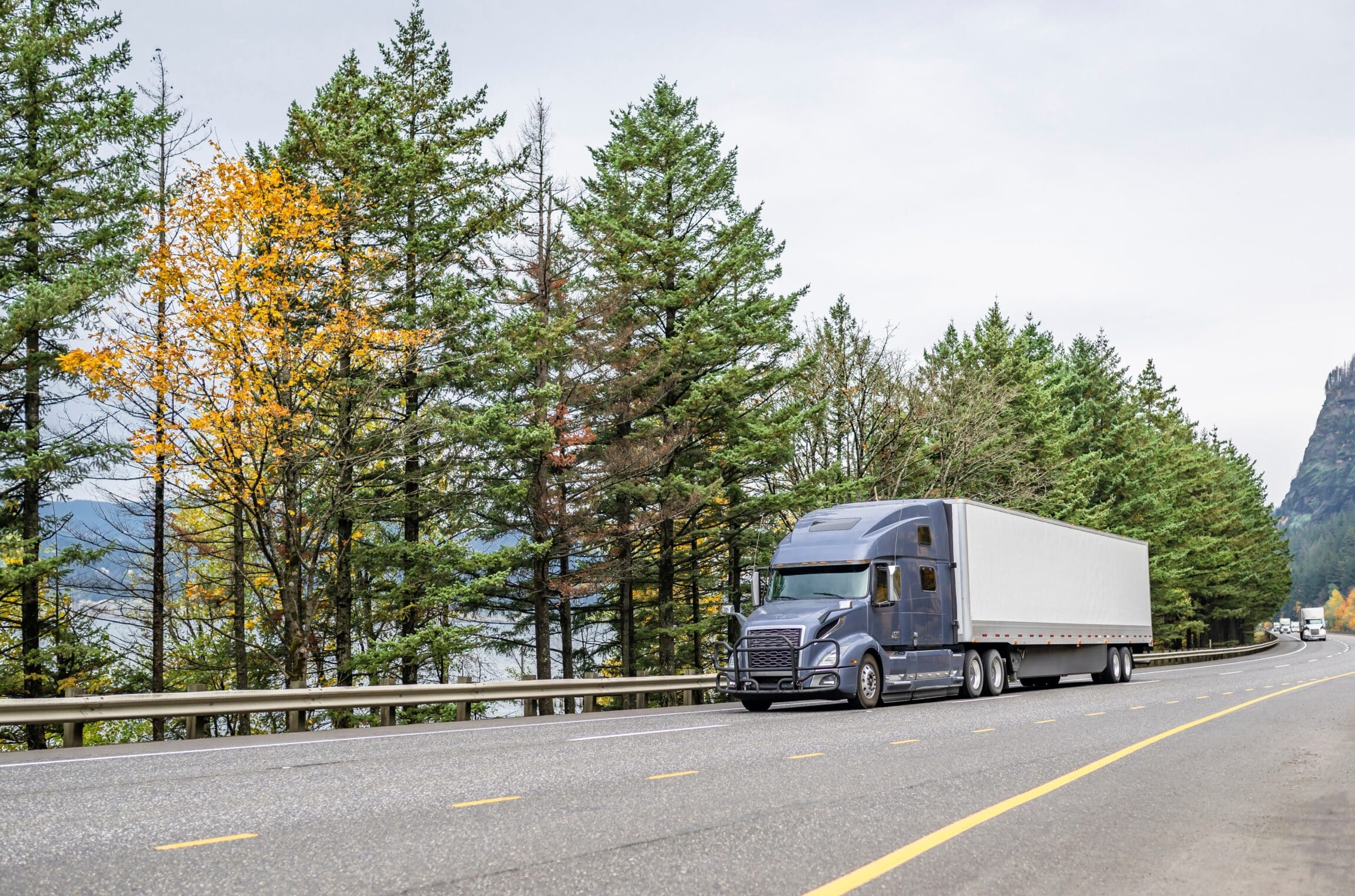 Classic carrier big rig gray semi truck