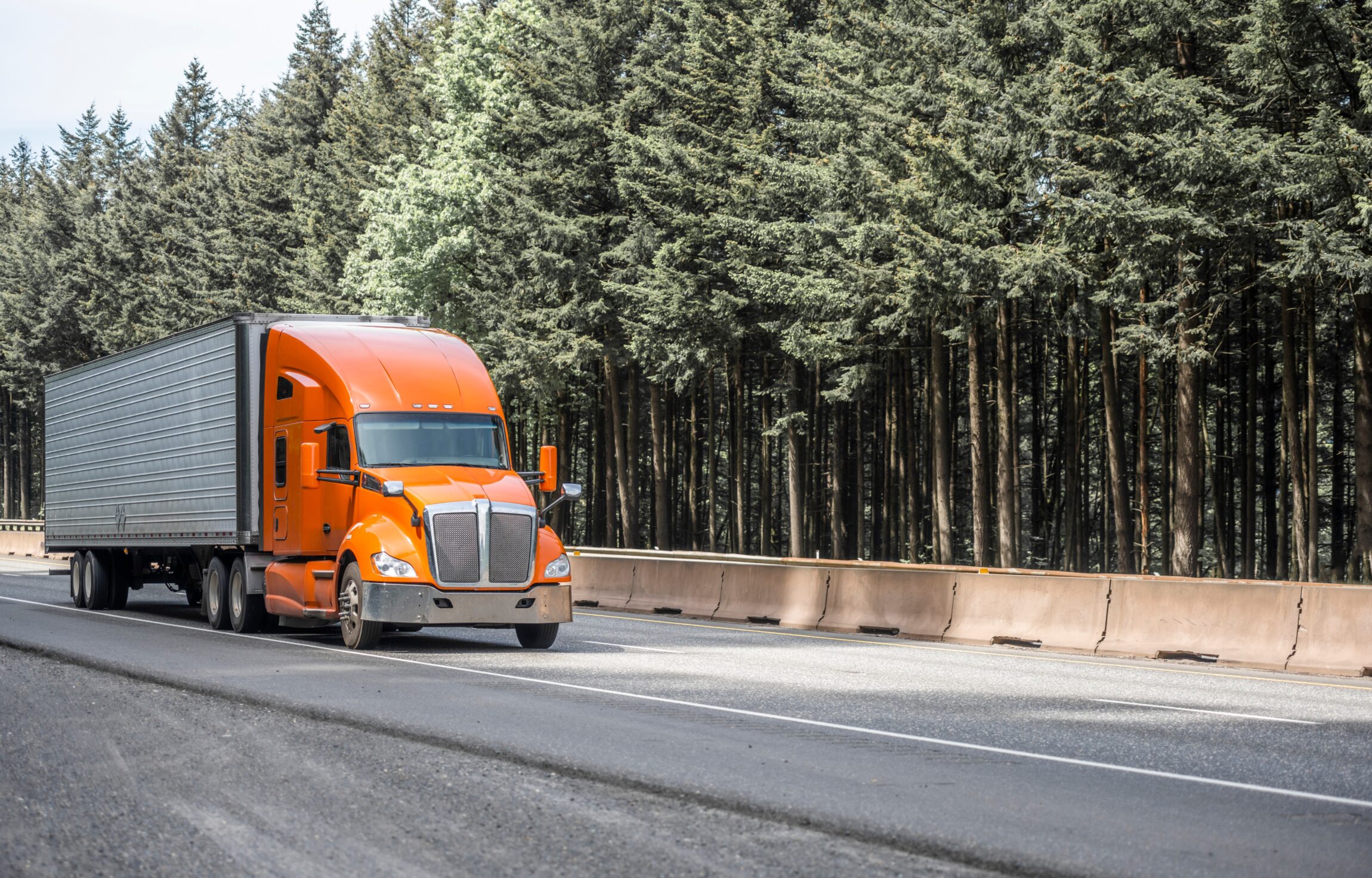 Bright orange big rig semi truck