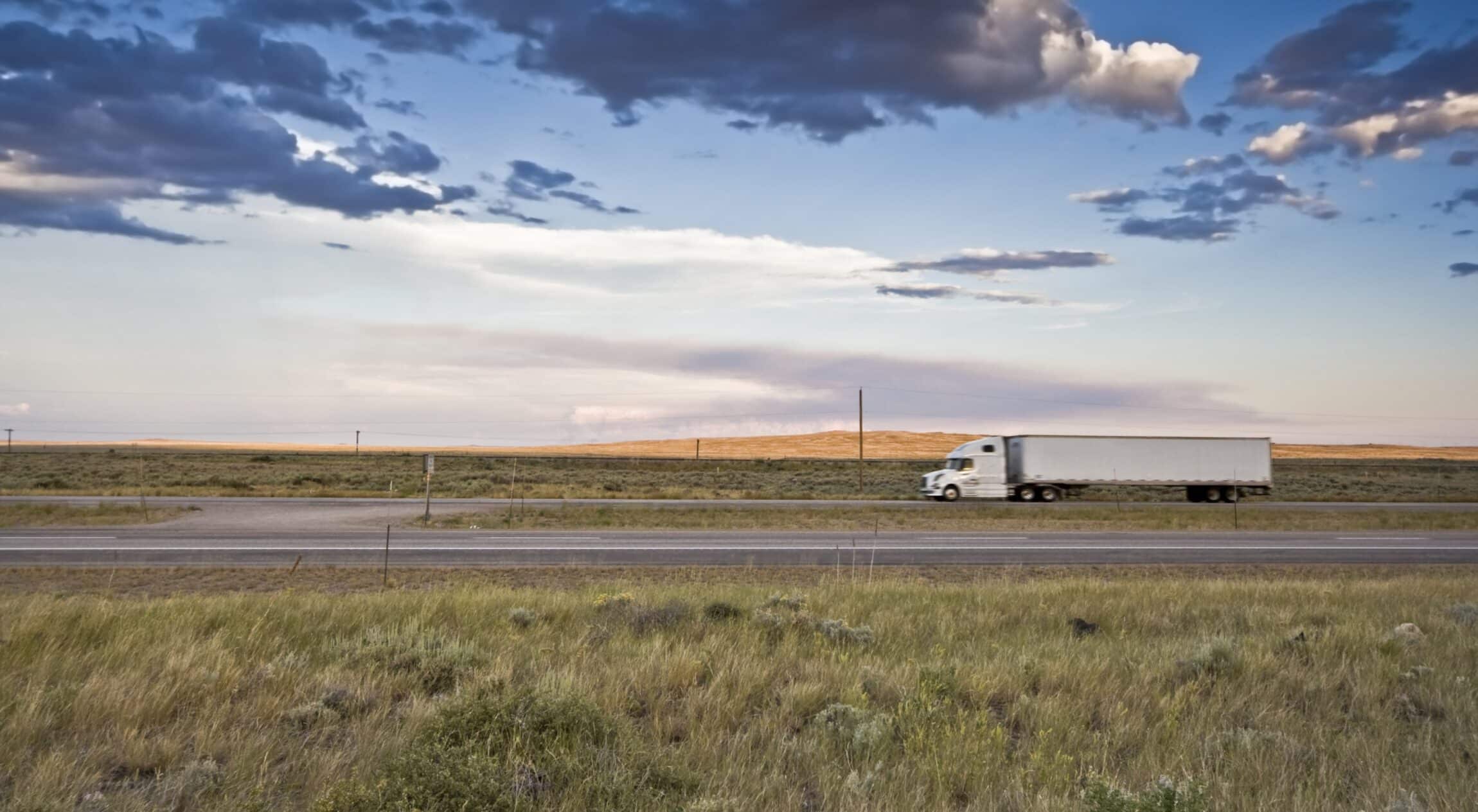 truck riding on a sunset