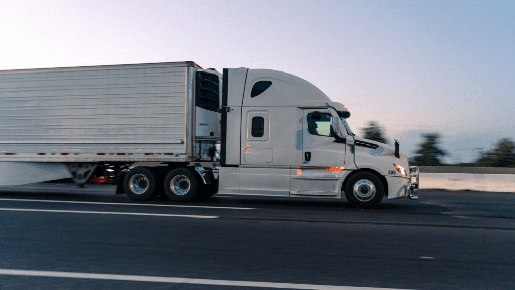 White commercial truck on road
