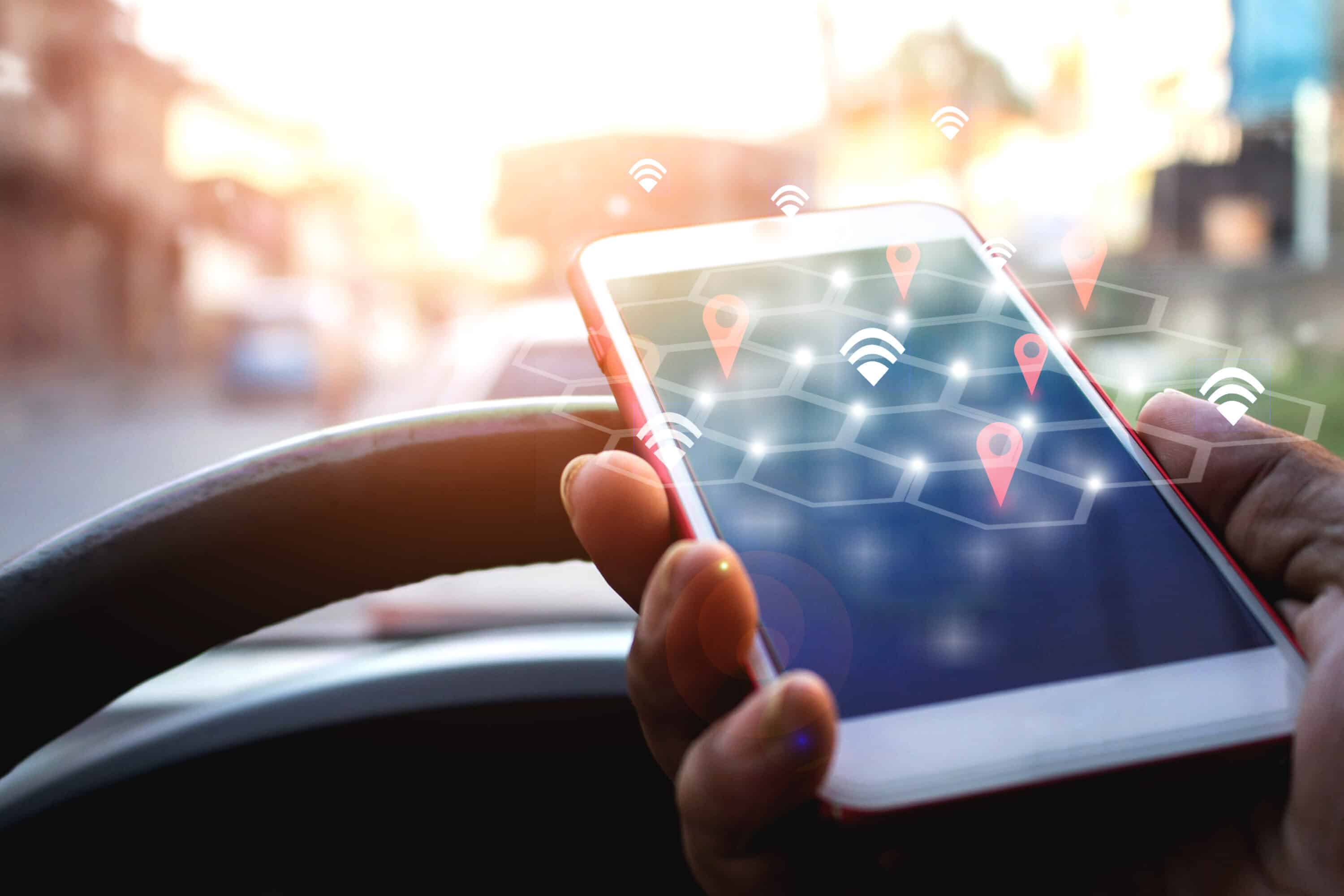 trucker holding a mobile phone