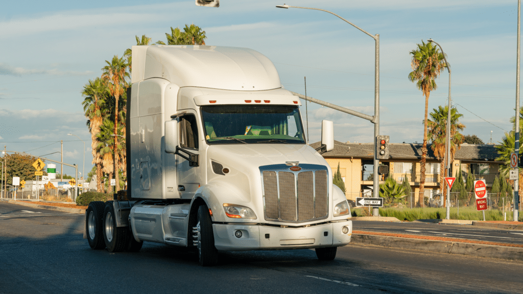 Big semi driving through city