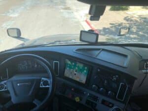 driver's cabin with eld mounted on dashboard