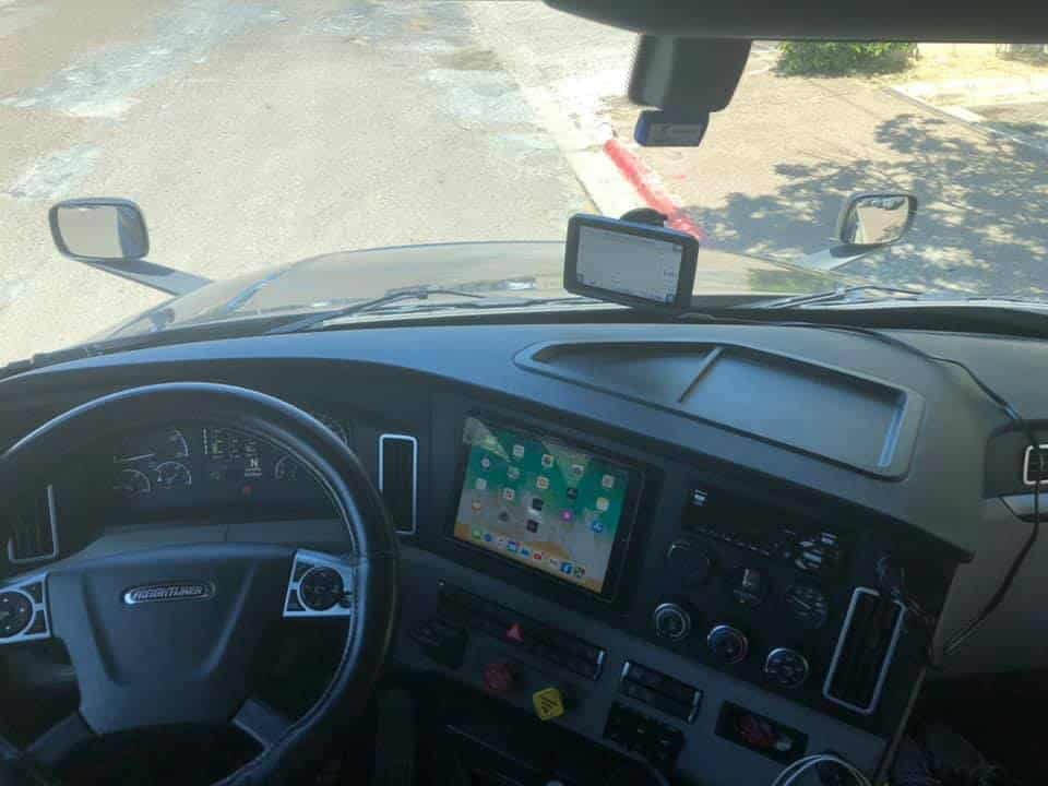 driver's cabin with eld mounted on dashboard