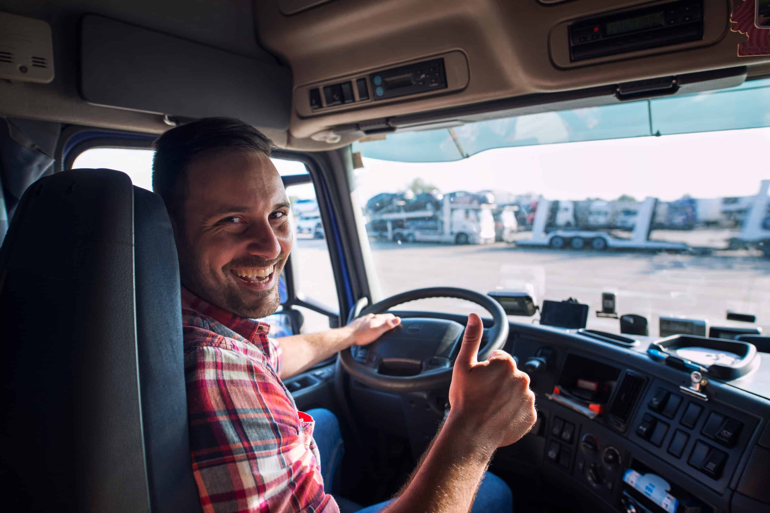 happy trucker in a truck