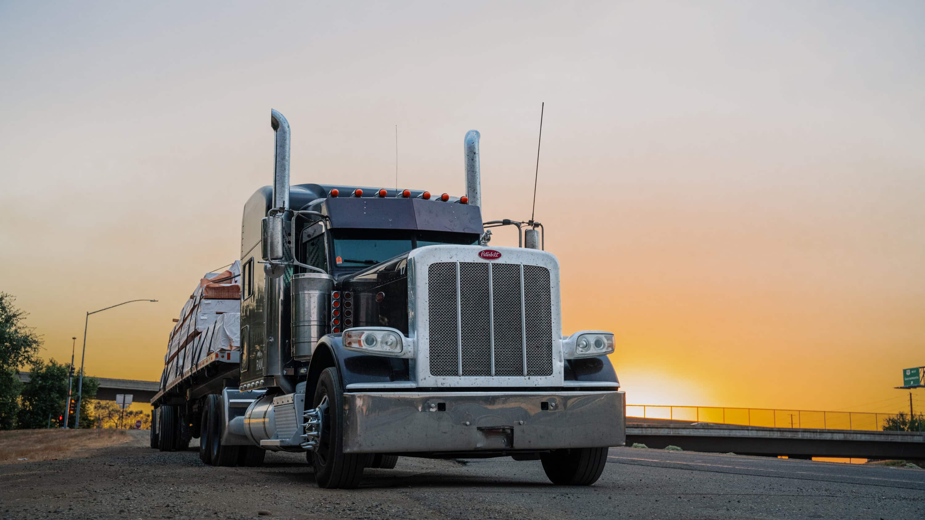 Heavy truck on the sunset