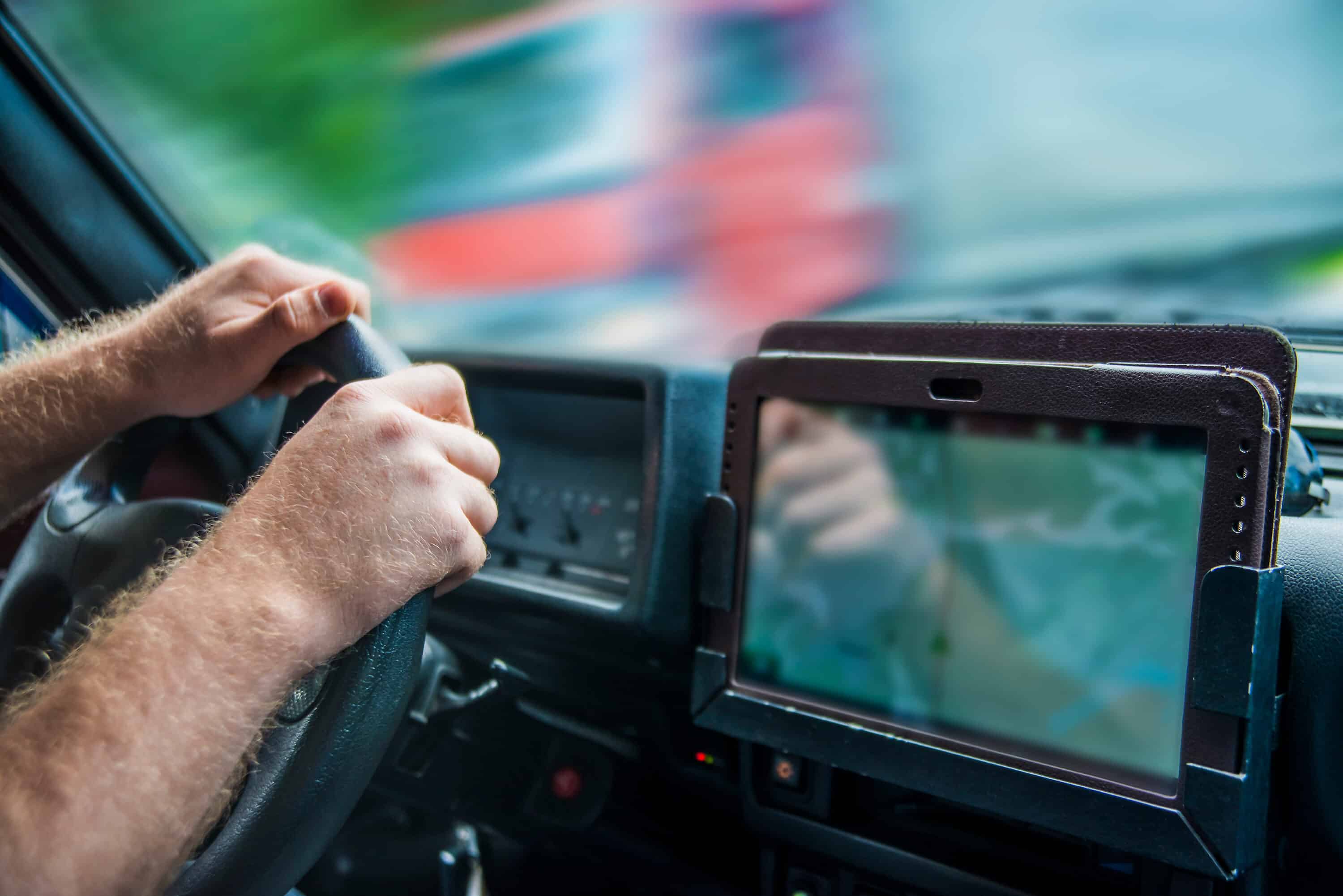 trucker's hands on the wheel