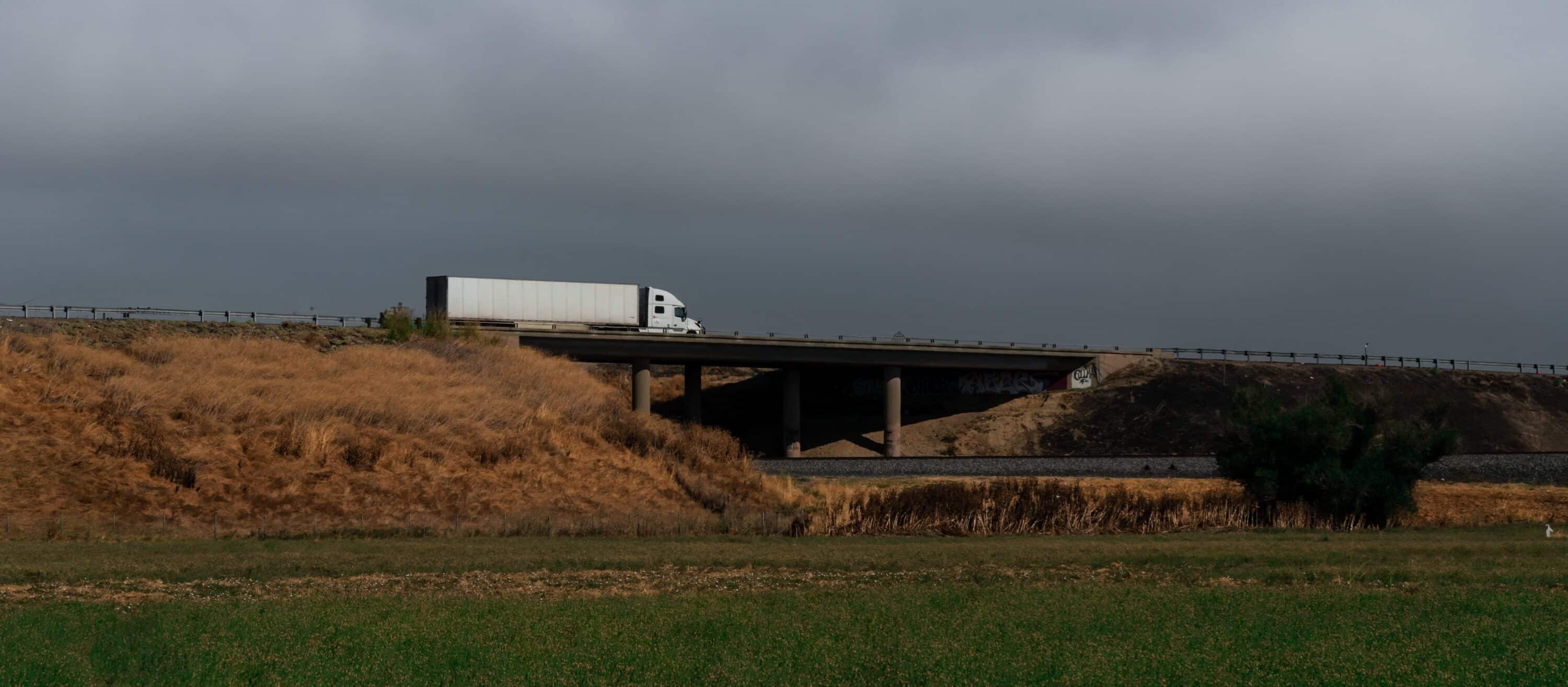 truck crossing the bridge
