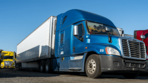 big rig with blue cabin parked