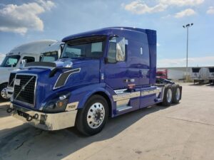 Blue Volvo semi-truck parked outdoors for Clean Truck Check compliance inspection.