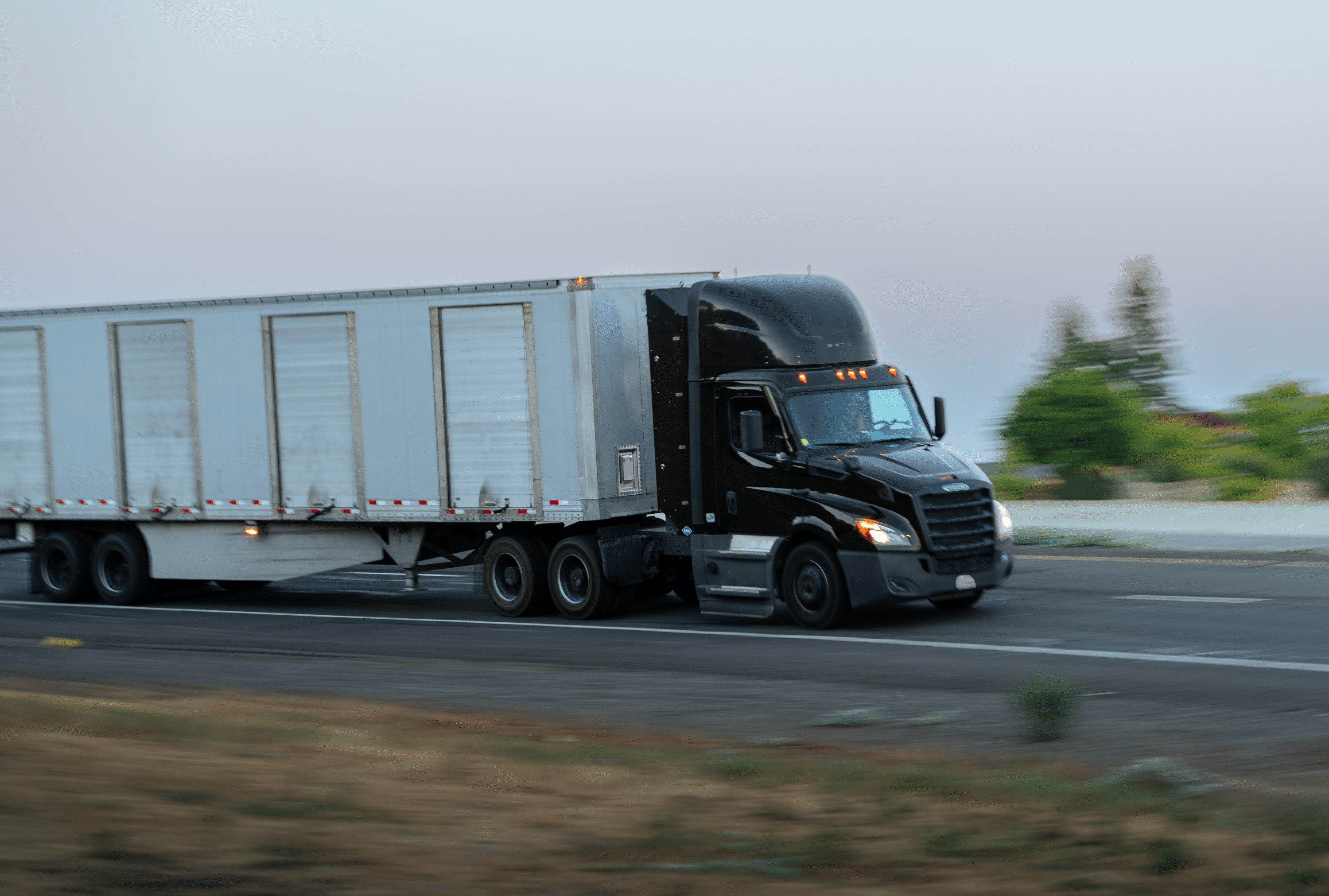 Semi-truck transporting freight under FMCSA hours of service regulations