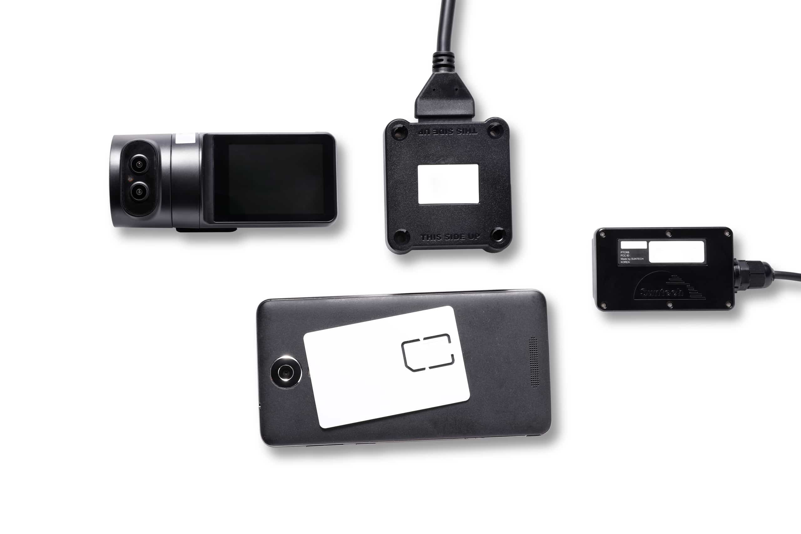 HOS247 fleet safety hardware including ELD device, dash camera, and vehicle tracking equipment