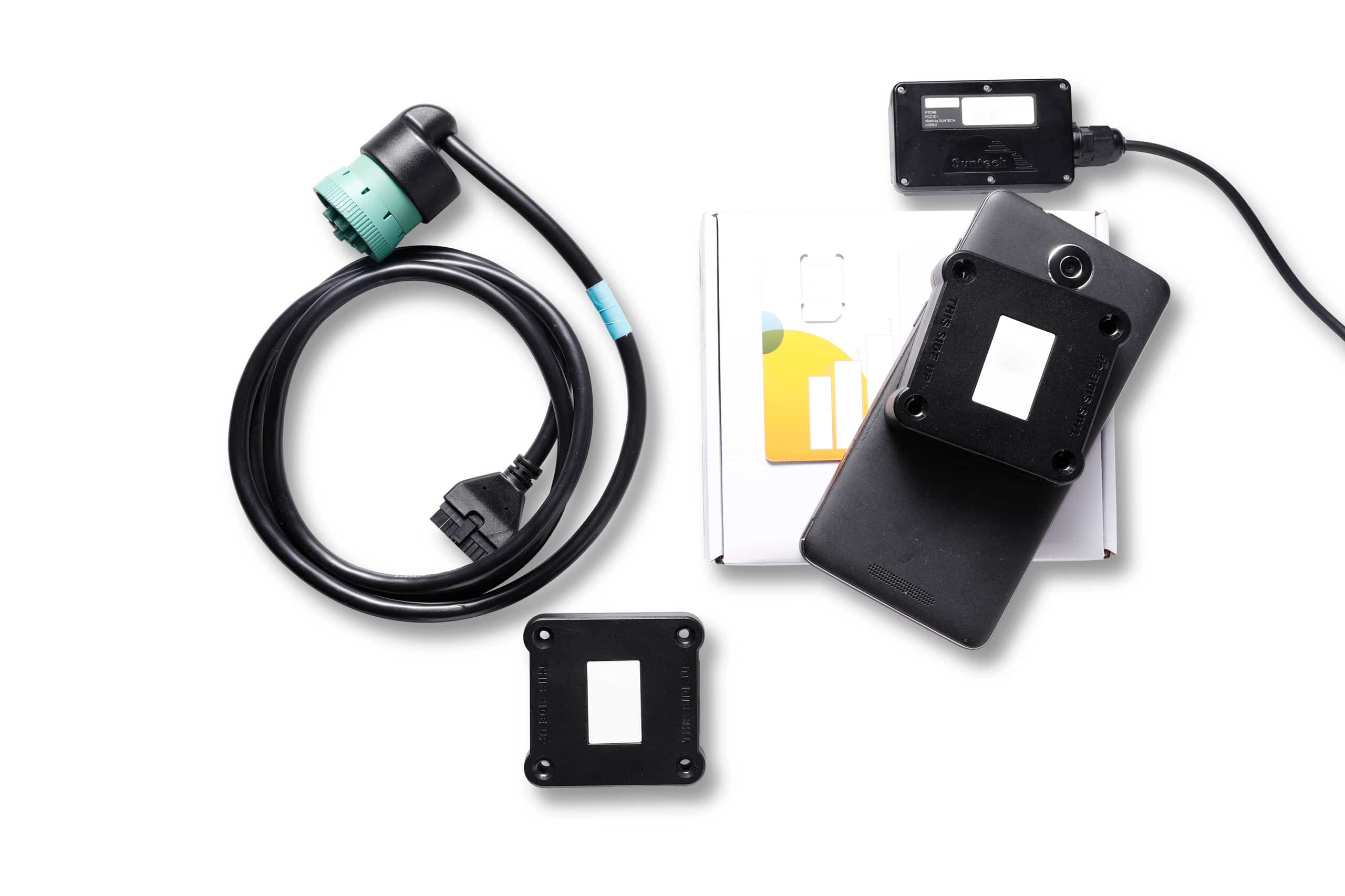 HOS247 electronic logging device hardware kit with cables and mounting accessories displayed on a white background
